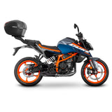 Fixation pour Top Case KTM Duke 125/390 - LE PRATIQUE DU MOTARD