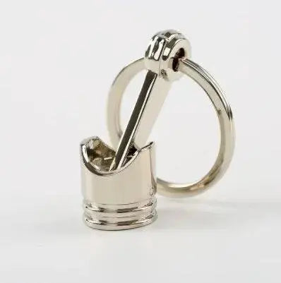 Porte-clé piston en métal - Le Pratique du Motard